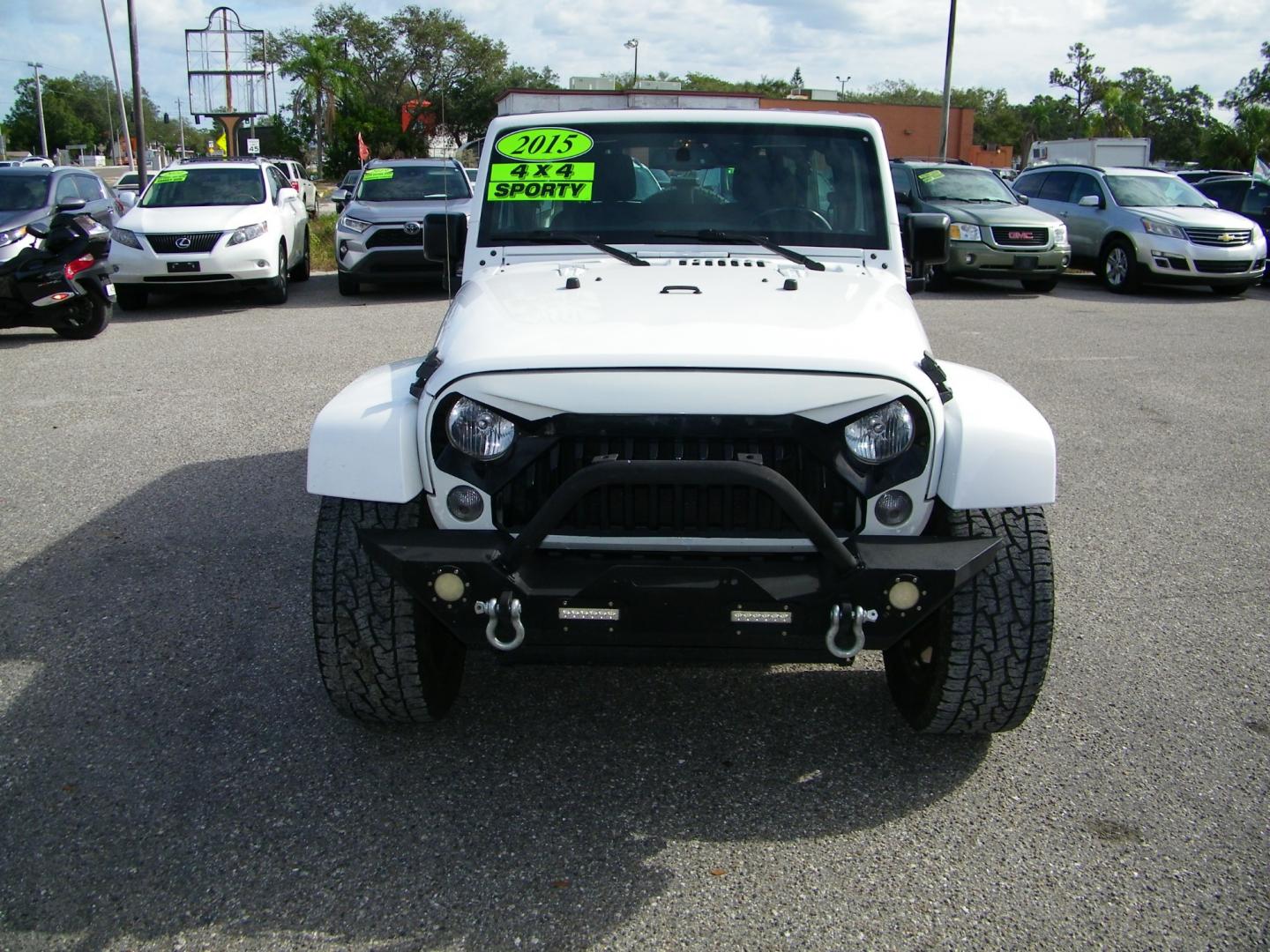 2015 White /Black Jeep Wrangler Unlimited Sahara 4WD (1C4BJWEGXFL) with an 3.6L V6 DOHC 24V FFV engine, Automatic transmission, located at 4000 Bee Ridge Road, Sarasota, FL, 34233, (941) 926-0300, 27.298664, -82.489151 - Photo#1